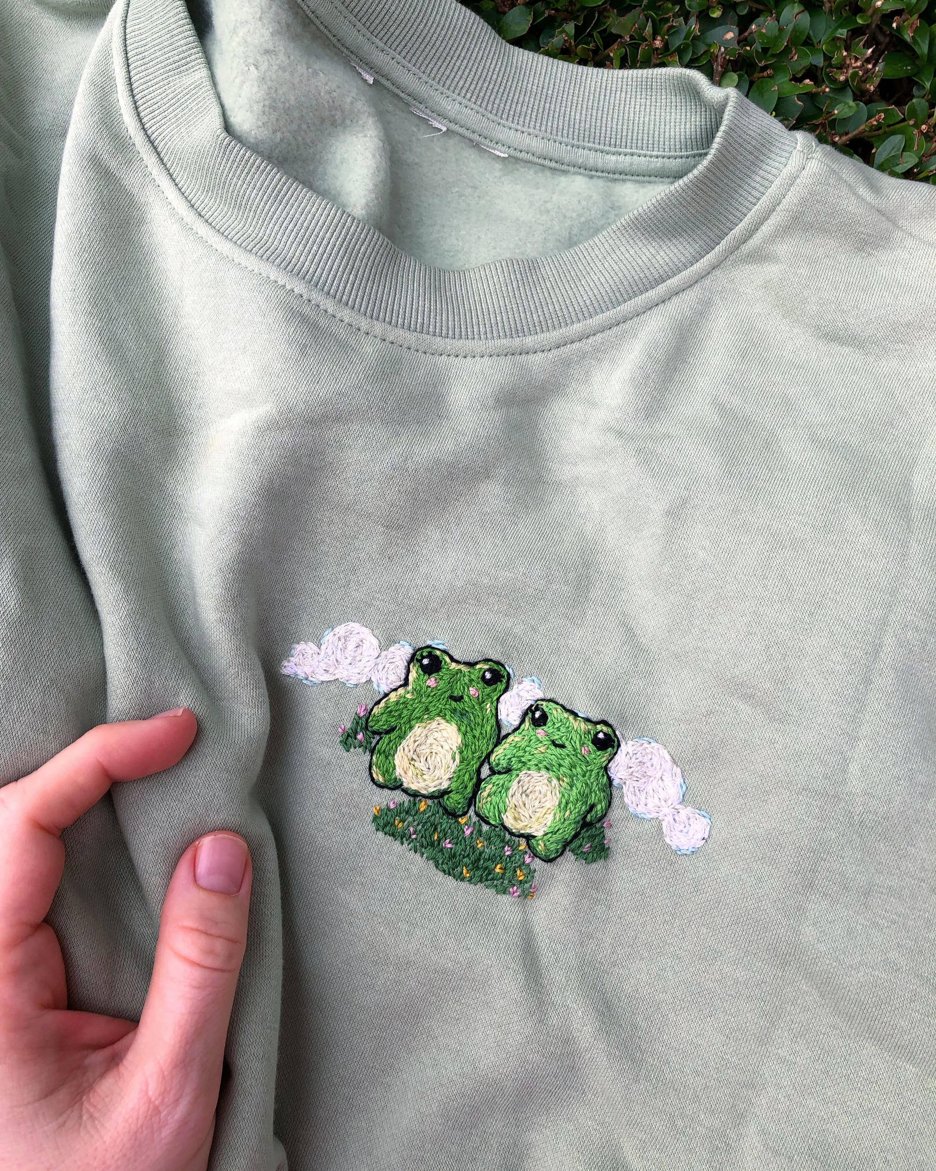 frog embroidery on sweatshirt